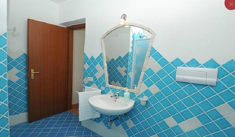 Gallo Spot Hotel San Teodoro  Bilik gambar